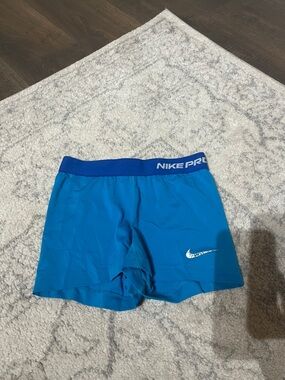 Nike Blue Performance Compression Shorts with White Swoosh